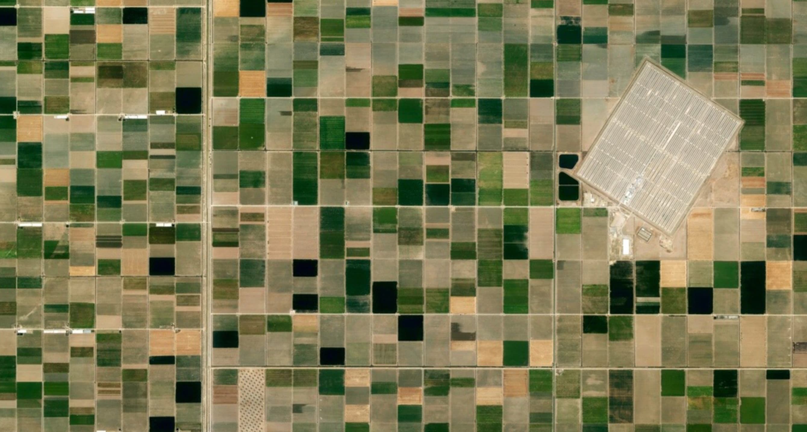 “Lebrija 1 Solar Power Plant in Lebrija, Spain. ~170,000 individual mirrors installed on 6,048 parabolic troughs.”